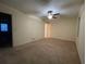 Spacious bedroom with neutral carpet, ceiling fan, and natural light from a window at 1038 Westfield Se Trce, Smyrna, GA 30082