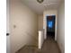 Upstairs hallway with carpet flooring, connecting to other rooms in the home at 1038 Westfield Se Trce, Smyrna, GA 30082