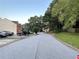 Street view showcasing the neighborhood, trees, and parked vehicles along the road at 1038 Westfield Se Trce, Smyrna, GA 30082