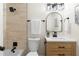 Bathroom featuring a shower, sink and modern fixtures at 1490 Diplomat Dr, Riverdale, GA 30296
