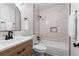 Bathroom featuring a shower, sink and modern fixtures at 1490 Diplomat Dr, Riverdale, GA 30296