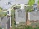 Aerial view of the property showcasing the home's layout, landscaping, and neighborhood surroundings at 2376 Roberts View Trail, Buford, GA 30519