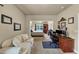 Inviting room with a blend of workspace and bedroom area, offering a flexible open layout at 2376 Roberts View Trail, Buford, GA 30519