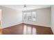 Empty bedroom features a light and airy feel with big windows at 5195 Belmore Manor Ct, Suwanee, GA 30024