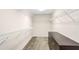 Walk-in closet with built in shelving at 5195 Belmore Manor Ct, Suwanee, GA 30024
