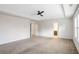 Expansive main bedroom with a tray ceiling, walk in closet and ensuite bathroom at 5195 Belmore Manor Ct, Suwanee, GA 30024
