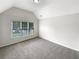 A bright bedroom with carpet, large windows, and natural lighting at 9979 Bridgewater Pointe, Villa Rica, GA 30180