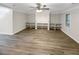 Empty bonus room with built-in shelves and wood-look floors at 9979 Bridgewater Pointe, Villa Rica, GA 30180