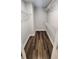Walk-in closet featuring laminate flooring and wire shelving for organization at 136 Walkers Pond Dr, Villa Rica, GA 30180