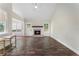 Spacious living room featuring a fireplace, vaulted ceilings, and hardwood floors at 136 Walkers Pond Dr, Villa Rica, GA 30180