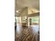 Bright living area showcases stylish floors with an open concept to the kitchen at 136 Walkers Pond Dr, Villa Rica, GA 30180