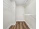 Walk-in closet with wire shelving and hardwood floors providing plenty of storage space at 136 Walkers Pond Dr, Villa Rica, GA 30180