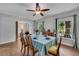 Cozy dining room with hardwood floors, natural light, and an adjacent living area for entertaining at 1732 Samaria Trl, Tucker, GA 30084