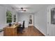 Bright dining area features a modern ceiling fan and a convenient workspace near the window at 1732 Samaria Trl, Tucker, GA 30084