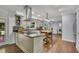 Modern kitchen featuring stainless steel appliances, an island, and plenty of cabinet space at 1732 Samaria Trl, Tucker, GA 30084