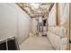 Unfinished basement space featuring exposed insulation, concrete foundation and HVAC unit at 3279 Greenhill Dr, Villa Rica, GA 30180