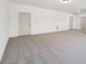 Bedroom featuring neutral carpet, white walls and a stylish white interior door at 3279 Greenhill Dr, Villa Rica, GA 30180