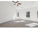 Bright bedroom with plush carpeting and natural light coming through ample windows at 3279 Greenhill Dr, Villa Rica, GA 30180