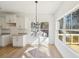 Cozy breakfast area features hardwood floors, modern lighting and provides access to a private wooden deck at 3279 Greenhill Dr, Villa Rica, GA 30180