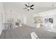 Loft area with an overlooking view of the main living area, staircase, and kitchen at 3279 Greenhill Dr, Villa Rica, GA 30180