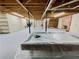 Spacious unfinished basement featuring a brick fireplace and pool table at 342 Mccurry Rd, Stockbridge, GA 30281