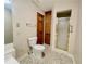 Bathroom featuring a toilet, and shower with gold trim and sliding glass door at 342 Mccurry Rd, Stockbridge, GA 30281