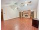 Open-concept living space with fireplace, vaulted ceiling, and ceiling fans at 342 Mccurry Rd, Stockbridge, GA 30281