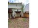 Backyard featuring a deck, some green grass, and some trees at 5047 Chupp Way Cir, Lithonia, GA 30038