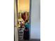 Walk-in closet with clothes and suitcases at 5047 Chupp Way Cir, Lithonia, GA 30038