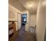 Carpeted hallway leading downstairs and into another room at 5047 Chupp Way Cir, Lithonia, GA 30038