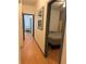 Hallway with hardwood floors and two bedrooms at 5047 Chupp Way Cir, Lithonia, GA 30038