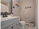 Bathroom featuring a modern vanity, stylish fixtures, and a shower with a curtain, combining functionality with modern decor at 92 Confidence Ct, Temple, GA 30179