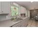 Bright kitchen featuring abundant natural light, modern fixtures, and ample counter space, perfect for culinary enthusiasts at 92 Confidence Ct, Temple, GA 30179