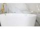 Close-up of soaking tub in modern bathroom at 1129 Pinehurst Rd, Grayson, GA 30017