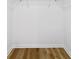 Walk-in closet featuring wood-look floors and white wire shelving at 1129 Pinehurst Rd, Grayson, GA 30017