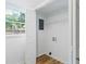 Walk in closet has hardwood floor and a window providing natural light and outdoor views at 1129 Pinehurst Rd, Grayson, GA 30017