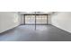 This large garage features a sealed floor, overhead lighting, and a window to the exterior at 1129 Pinehurst Rd, Grayson, GA 30017