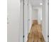 Bright hallway with white walls and hardwood floors at 1129 Pinehurst Rd, Grayson, GA 30017