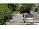 A high angle view of the property showcasing a detached garage and the newly constructed fence at 130 South Se Ave, Marietta, GA 30060