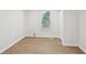 Bright bedroom featuring wood-look flooring and a window providing natural light at 130 South Se Ave, Marietta, GA 30060