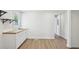 Kitchenette with white cabinets and wood countertops, showcasing ample space and storage at 130 South Se Ave, Marietta, GA 30060