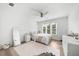 Clean bedroom features bright natural lighting and a ceiling fan at 1358 Peppergrass Nw Trl, Acworth, GA 30101