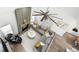 Open-concept living room boasts soaring ceilings, fireplace, and a large sectional sofa at 1358 Peppergrass Nw Trl, Acworth, GA 30101