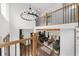 Open concept living space with high ceilings, chandelier, wood beams and access to outdoor space at 1358 Peppergrass Nw Trl, Acworth, GA 30101