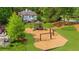 Community playground includes swings, a slide, and climbing area for children at 1358 Peppergrass Nw Trl, Acworth, GA 30101