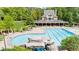 Aerial view of the freeform community pool, rock waterfall and zero entry access at 1358 Peppergrass Nw Trl, Acworth, GA 30101