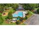 Aerial view of a community pool, slide and play area at 1358 Peppergrass Nw Trl, Acworth, GA 30101