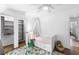 Comfortable bedroom with built-in storage, cheerful decor, and ample closet space at 3294 Mcclure Bridge Rd, Duluth, GA 30096