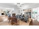 Open living room featuring hardwood floors, built-in bookshelves, and a fireplace at 3294 Mcclure Bridge Rd, Duluth, GA 30096