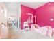Pink bedroom with princess decor, carpet, and ample natural light from two large windows at 500 Garvin Dr, Woodstock, GA 30189